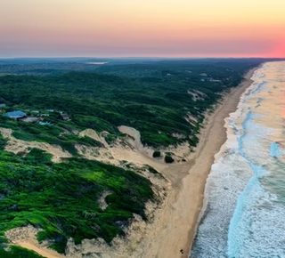 Dunes at Sunset Beach Resort Chidenguele Mozambique - Experience the breathtaking sand dunes and unique coastal landscape formations.
