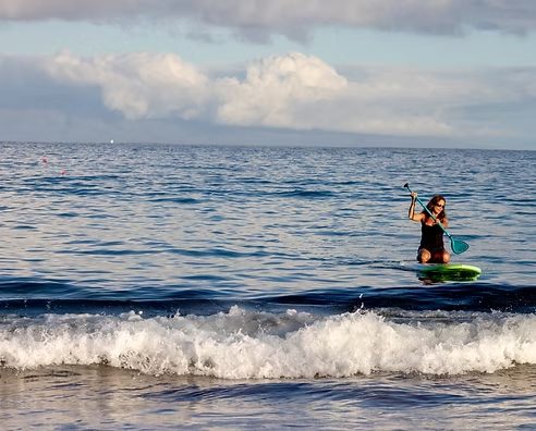 Paddle Skiing at Sunset Beach Resort Chidenguele Mozambique - Glide across the water on paddle skis and enjoy an exhilarating water sport adventure.