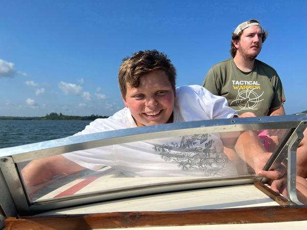 Family boat tour experience at Chidenguele beach resort