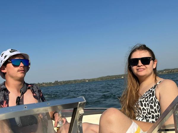 Couple enjoying scenic boat tour views at Mozambique resort