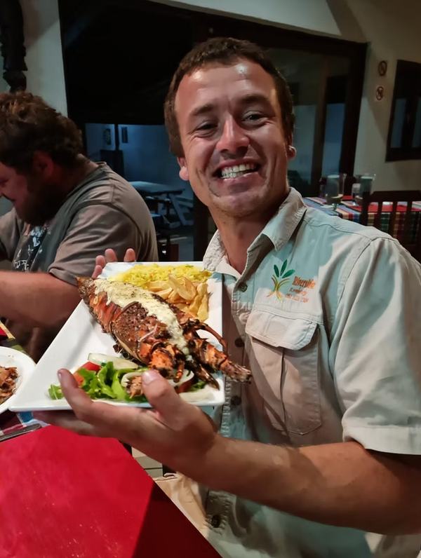 Fresh lobster seafood dinner at Sunset Beach Resort restaurant Chidenguele