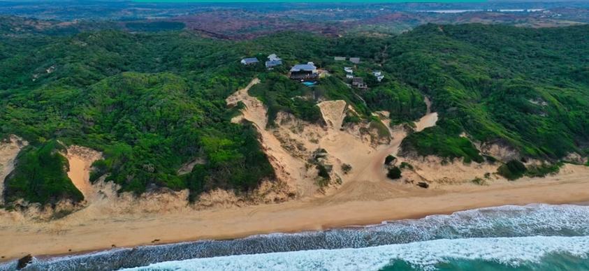 Aerial view of Sunset Beach Resort showing beachfront location and stunning ocean views in Chidenguele, Mozambique