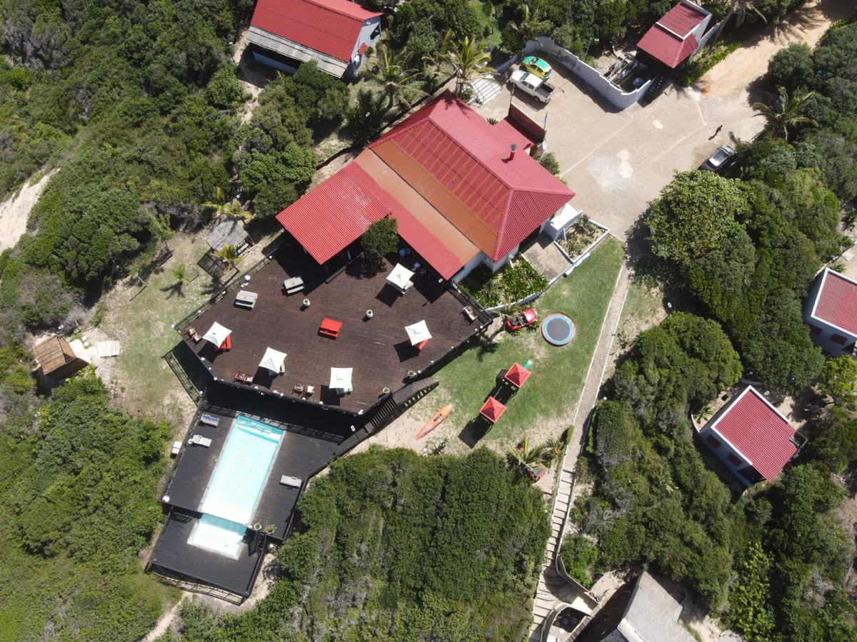 Aerial view of Sunset Beach Resort showing the prime beachfront location in Chidenguele with direct beach access